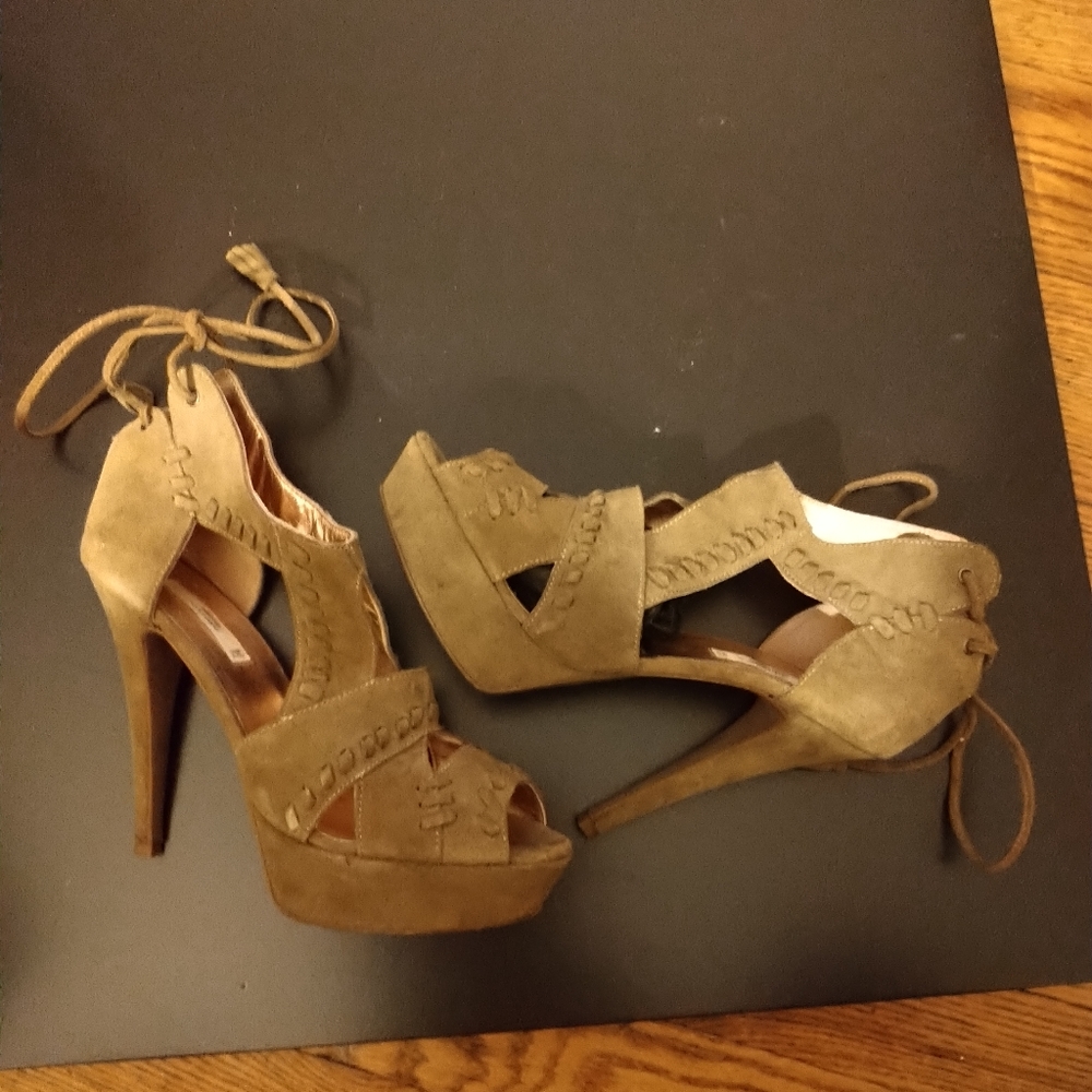 Beige platform sandals.
